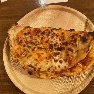 A calzone someone else ordered &amp; I watched being made. Definitely ordering this next time!
