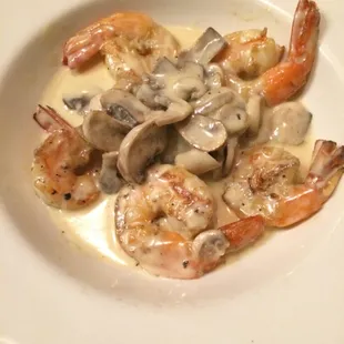 My special request of a side of sautéed shrimp and mushrooms in cream sauce.
