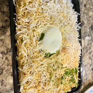 a dish of rice and vegetables