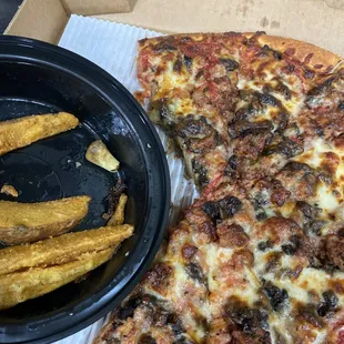 Dirty fryers and burnt pizza. Chicken bones in Jo Jo's.