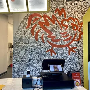 a counter with a laptop on it