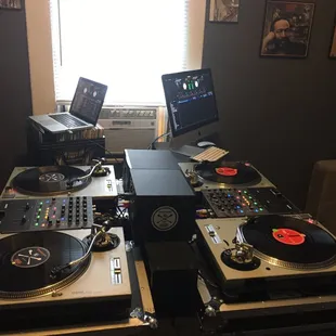 two turntables and a laptop