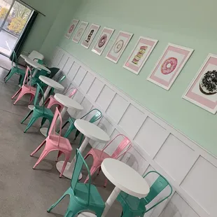 a row of tables and chairs