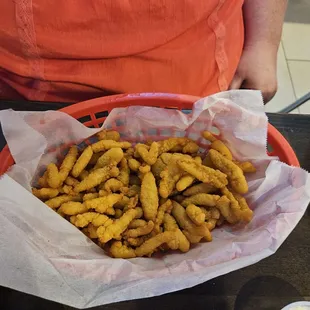 Fried clams. Not too spicy, great with the provided sauces.