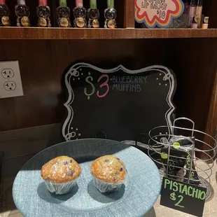 two muffins on a blue plate