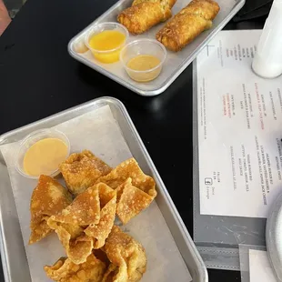 Mama&apos;s egg rolls and cheeseburger wontons