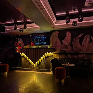a dark room with a wooden floor