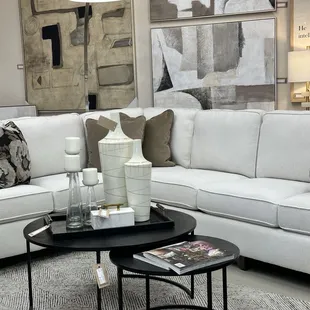 Sectional sofa, table, accessories, pillows, artwork, lamps