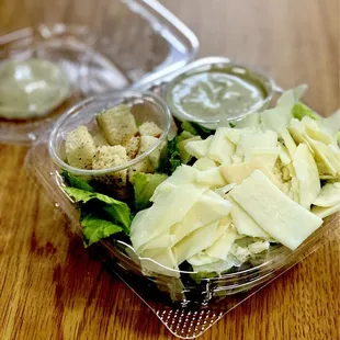 Small Cesar Salad. Comes with in-house made Cesar dressing with anchovies croutons &amp; topped w/their 3 cheese blend. Fabulous :)...