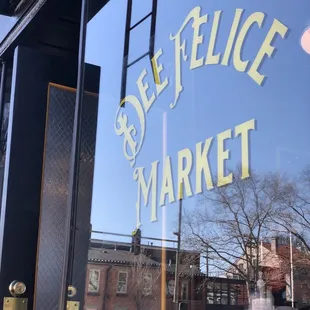 the reflection of a storefront window