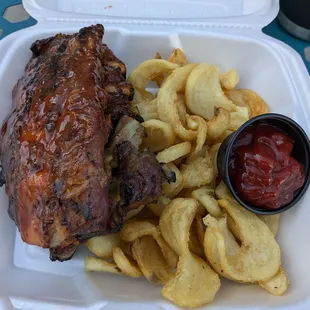 Half rack of ribs and fries for $26. Fries were delicious, ribs were ok.