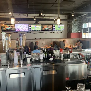 Wine bar and booths. Lot&apos;s of TV&apos;s.