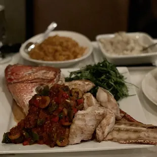 Broiled Whole Red Snapper (Cajun rice and whipped potatoes-$11 in the back)- $72. Please get this!! 3-4 people can eat on this!