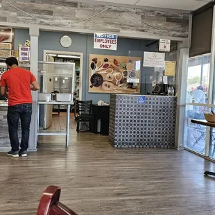 a man standing in a restaurant