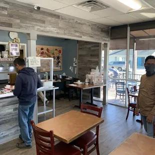 a man and a woman in a restaurant