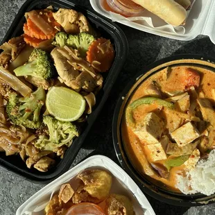 Pad see ew, red curry tofu, crab rangoons, spring rolls