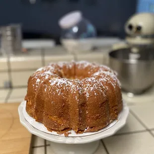 Our classic Plain Pound Cake topped with powdered sugar