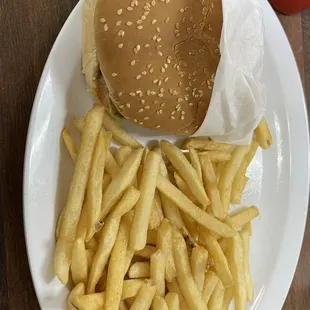 Freshly prepared cheese burger with fries juicy hot  Place is nice and clean will keep coming back