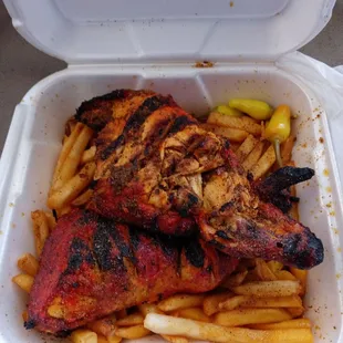 Half chicken special with fries and tortillas extra juice.