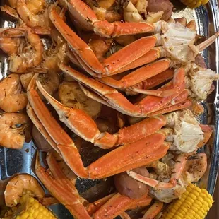 crab legs and corn on the cob