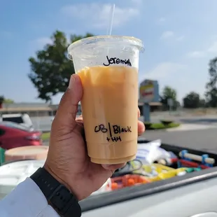Large cold brew with a splash of half and half