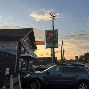 a car parked in front of a restaurant