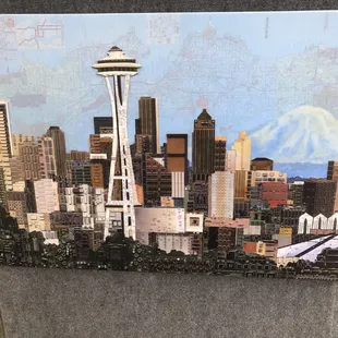 Seattle skyline made from computer bits and mother board pieces.