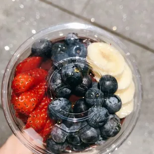 strawberries, bananas, and blueberries