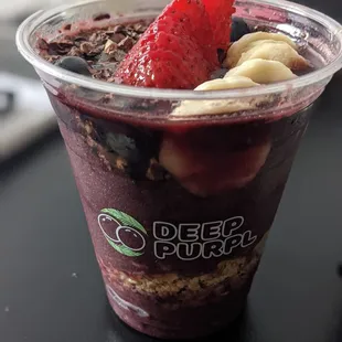 a smoothie in a plastic cup