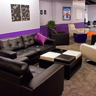 Comfortable bar/lounge area with 3 flat screen TVs.