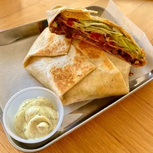 Vegan Crunch Wrap Supreme: Soy Chorizo, Black Beans, Cashew Queso, Pico De Gallo, Vegan Sour Cream, Lettuce