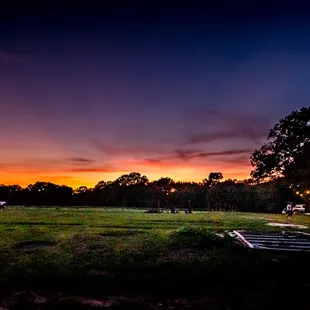 A colorful sunset at DeepRoots Vineyards