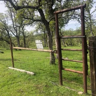 There are two fences with pedestrian gates on the Barn Pond Trail