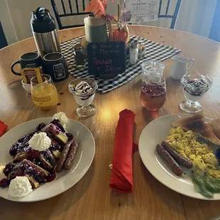 Breakfast-mixed berry french toast, sausage and eggs, parfaits, pineapple and cranberry mimosas plus tea