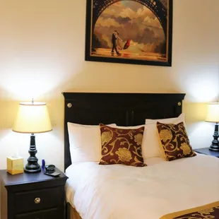 a bedroom with a king size bed