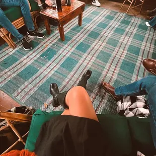 a group of people sitting in a living room