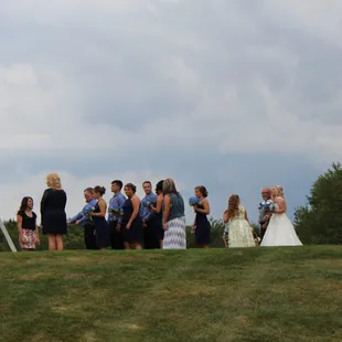 a group of brides and grooms