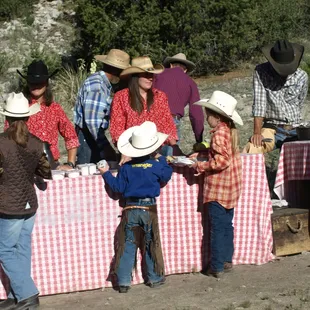 Eva and Amy serving Wranglers Breakfast