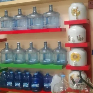 a shelf full of bottles