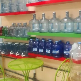 shelves of bottles and chairs