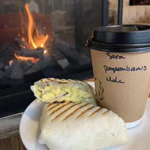 Maple, apple, sausage,egg burrito with pumpkinlicious latte. Both from the fall seasonal menu.
