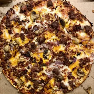 Cheeseburger pizza with bacon