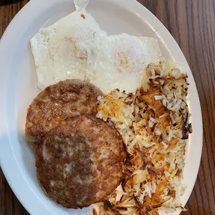Eggs over easy, hash browns and sausage