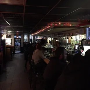 people sitting at the bar