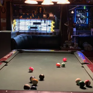 a pool table with balls on it