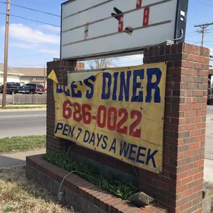 One side of sign is yellow.