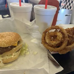 Dee Burger, onion rings, water, and tea.