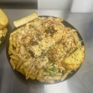 Salmon and shrimp Alfredo pasta