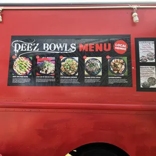 Da truck among Sugar Mills food trucks. They're posted up towards the back. Several picnic tables available to sit.