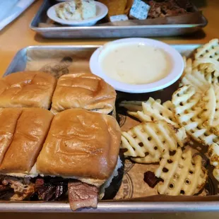 4 sliders, waffle fries and a side of queso